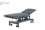 Medical treatment table with hydraulic rise low backrest